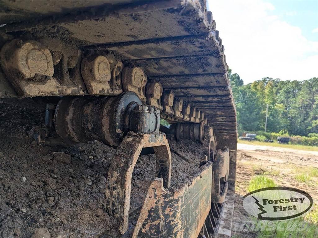 CAT 325D-FM Caricatronchi con base su rimorchio