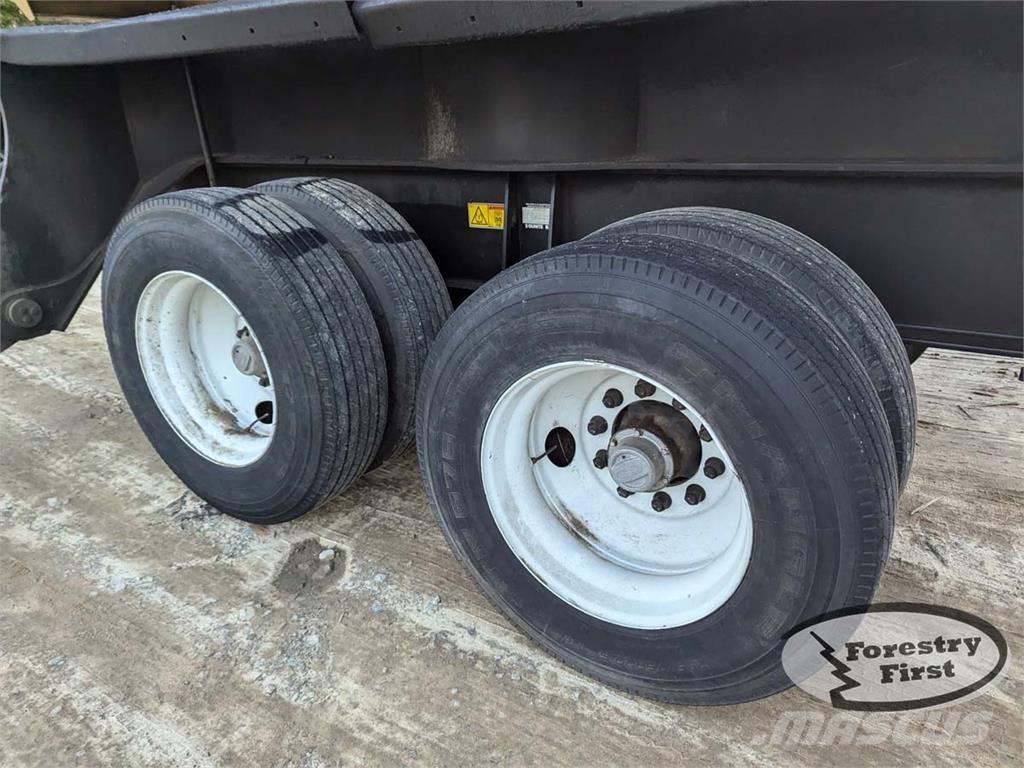 CAT 559C Caricatronchi con base su rimorchio