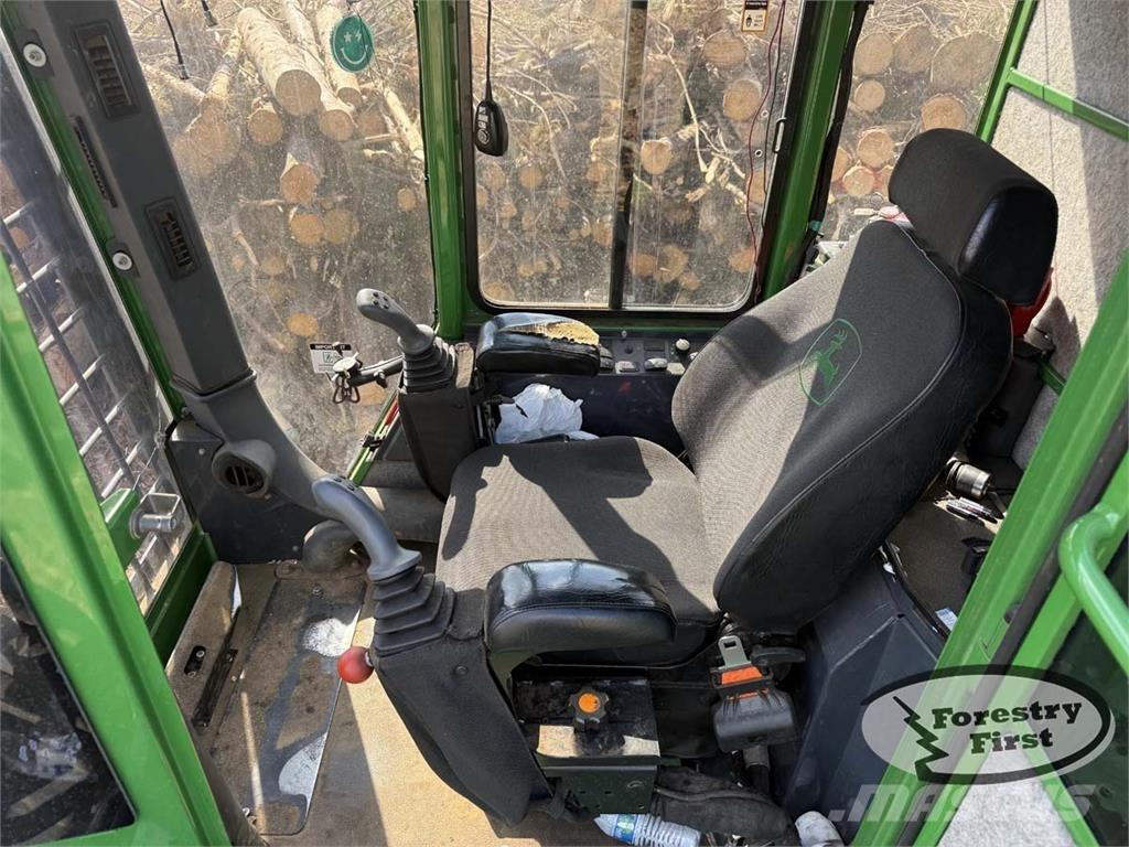 John Deere 437E Caricatronchi con base su rimorchio