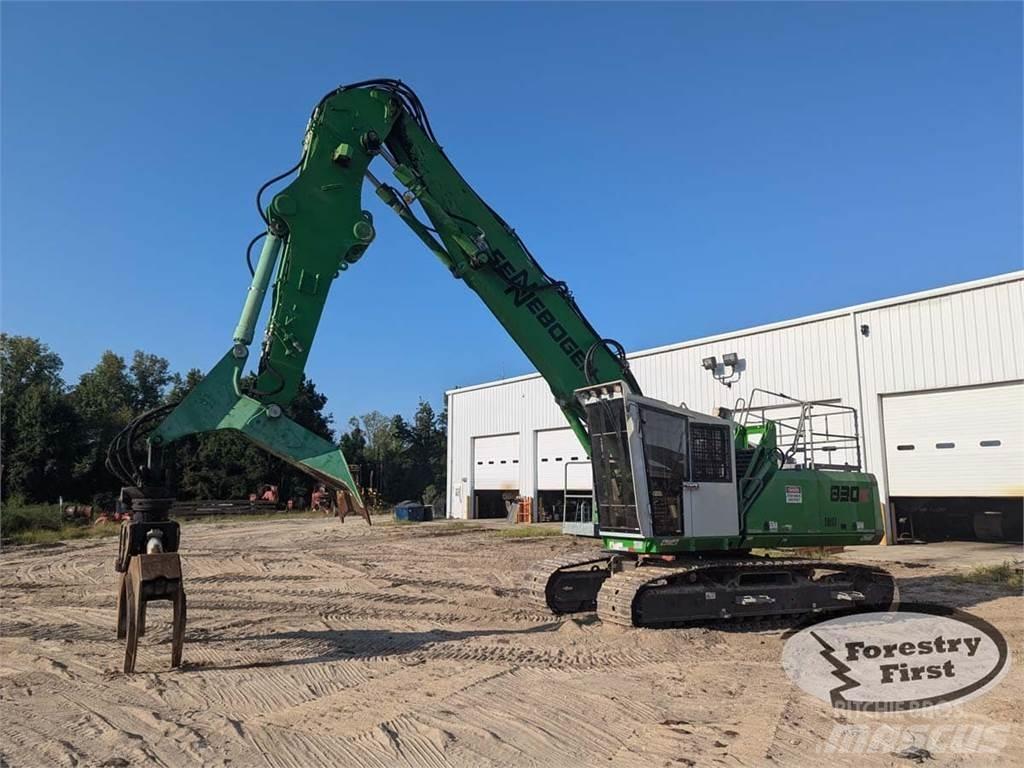 Sennebogen 830E Caricatronchi con base su rimorchio