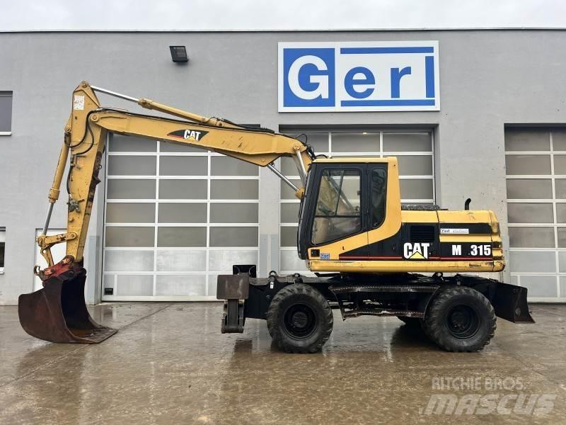 CAT M 315 Escavatori gommati