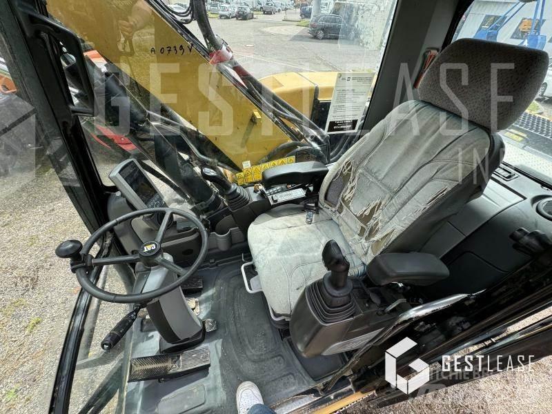CAT M313D Escavatori gommati