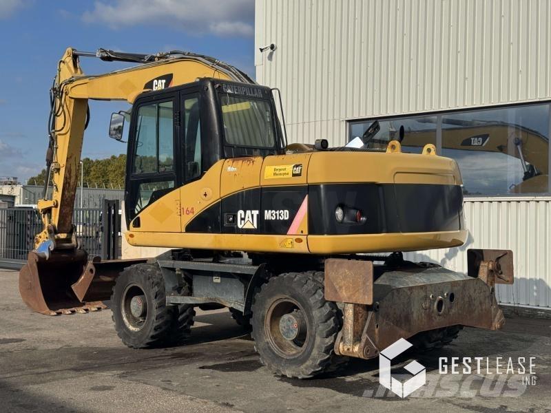 CAT M313D Escavatori gommati