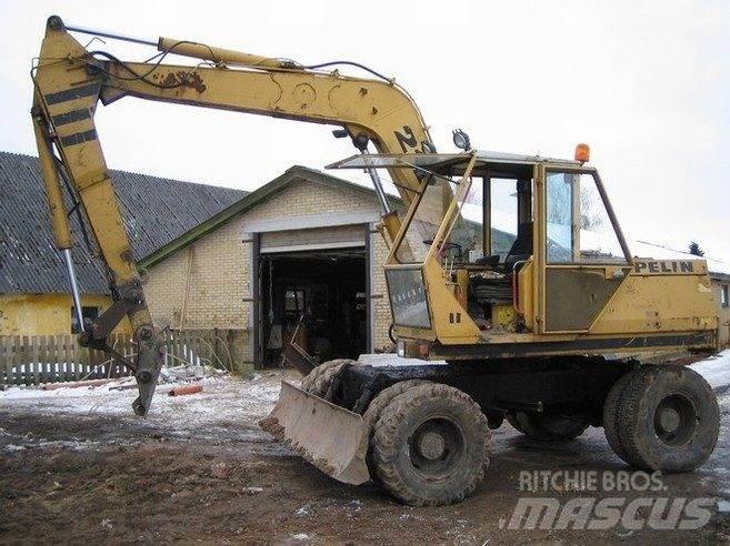 CAT 212 til ophug Escavatori cingolati
