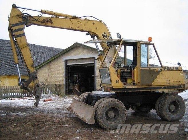 CAT 212 til ophug Escavatori cingolati