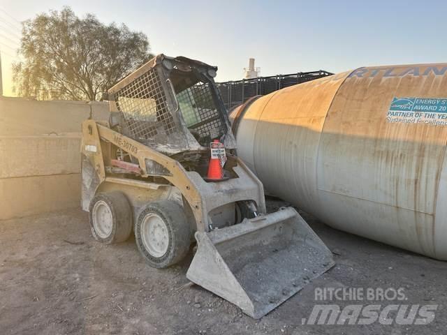 CAT 216B Mini Pale Gommate