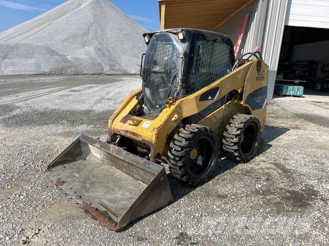 CAT 246C Mini Pale Gommate