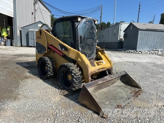 CAT 246C Mini Pale Gommate