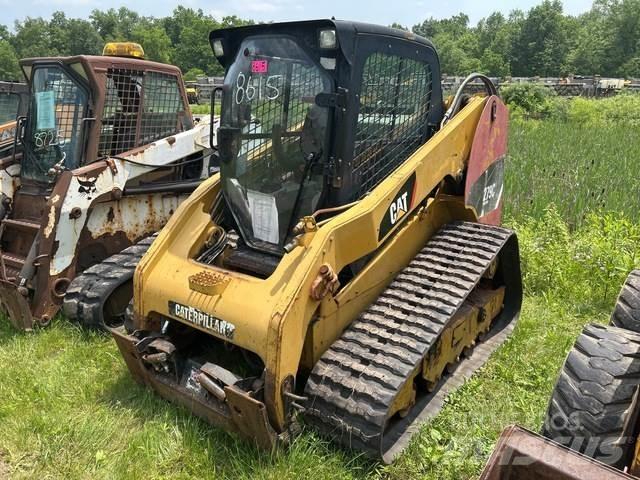 CAT 279C Mini Pale Gommate