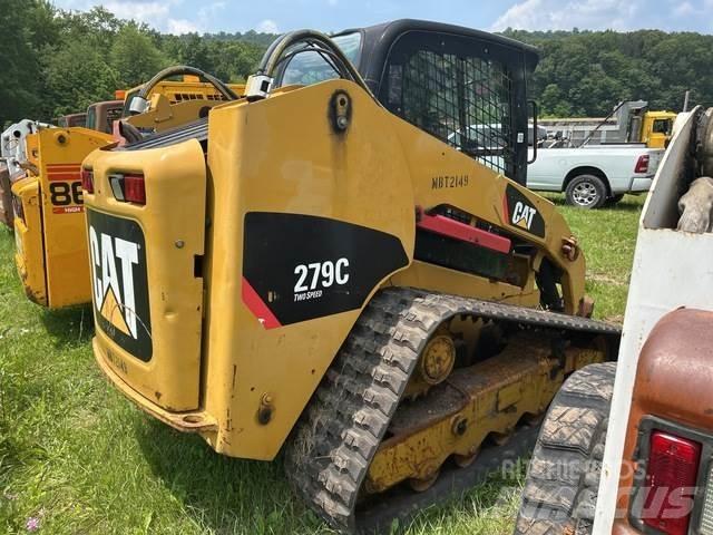 CAT 279C Mini Pale Gommate