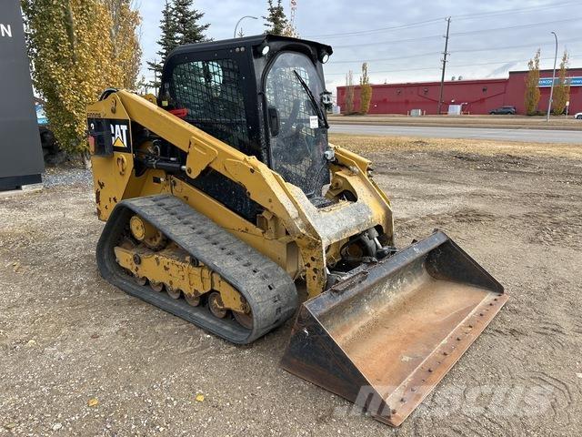CAT 279D Mini Pale Gommate