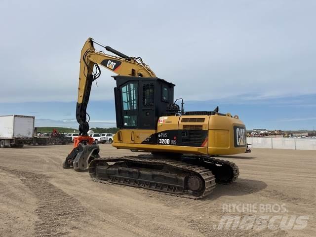 CAT 320DFM Segatronchi e spaccalegna