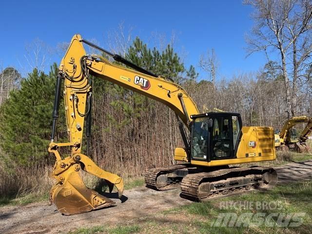 CAT 323 Escavatori cingolati