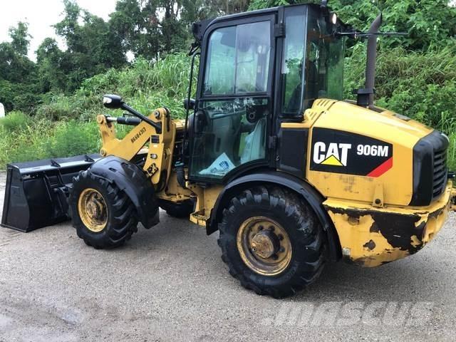 CAT 906M Pale gommate