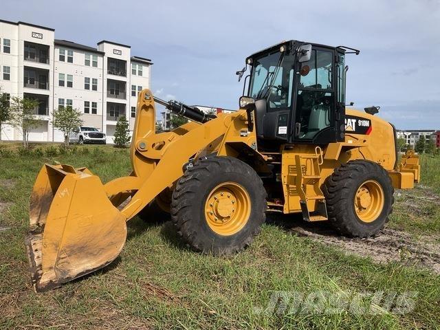 CAT 910M Pale gommate