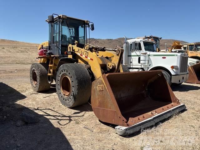 CAT 928G Pale gommate