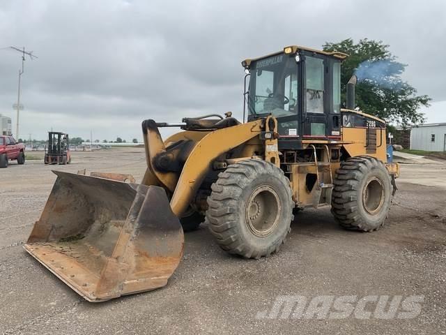 CAT 928G Pale gommate