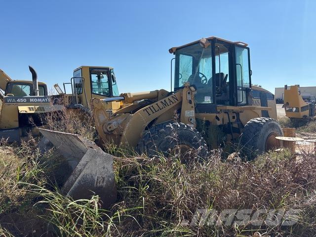 CAT 938G Pale gommate