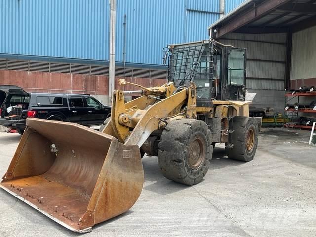CAT 938H Pale gommate