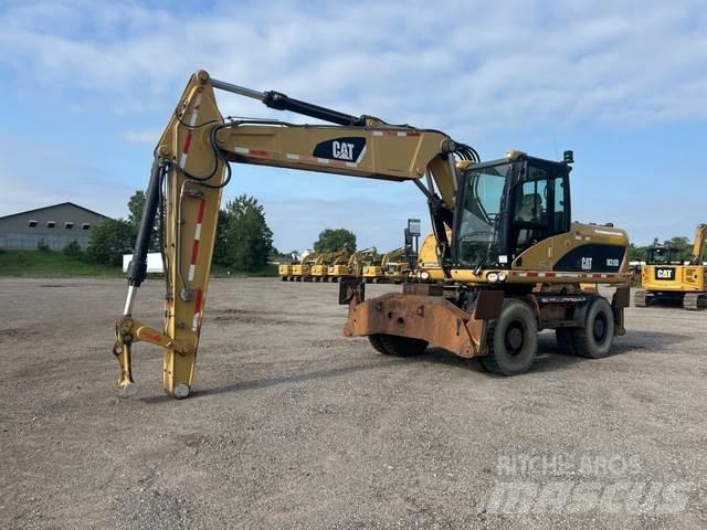CAT M318D Escavatori gommati