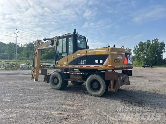 CAT M318D Escavatori gommati