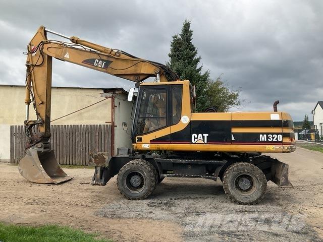 CAT M320 Escavatori gommati