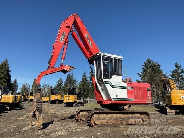 Madill 3800C Caricatronchi con base su rimorchio