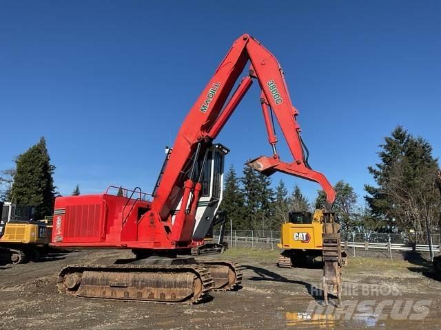 Madill 3800C Caricatronchi con base su rimorchio