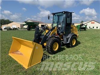 John Deere 244L Pale gommate