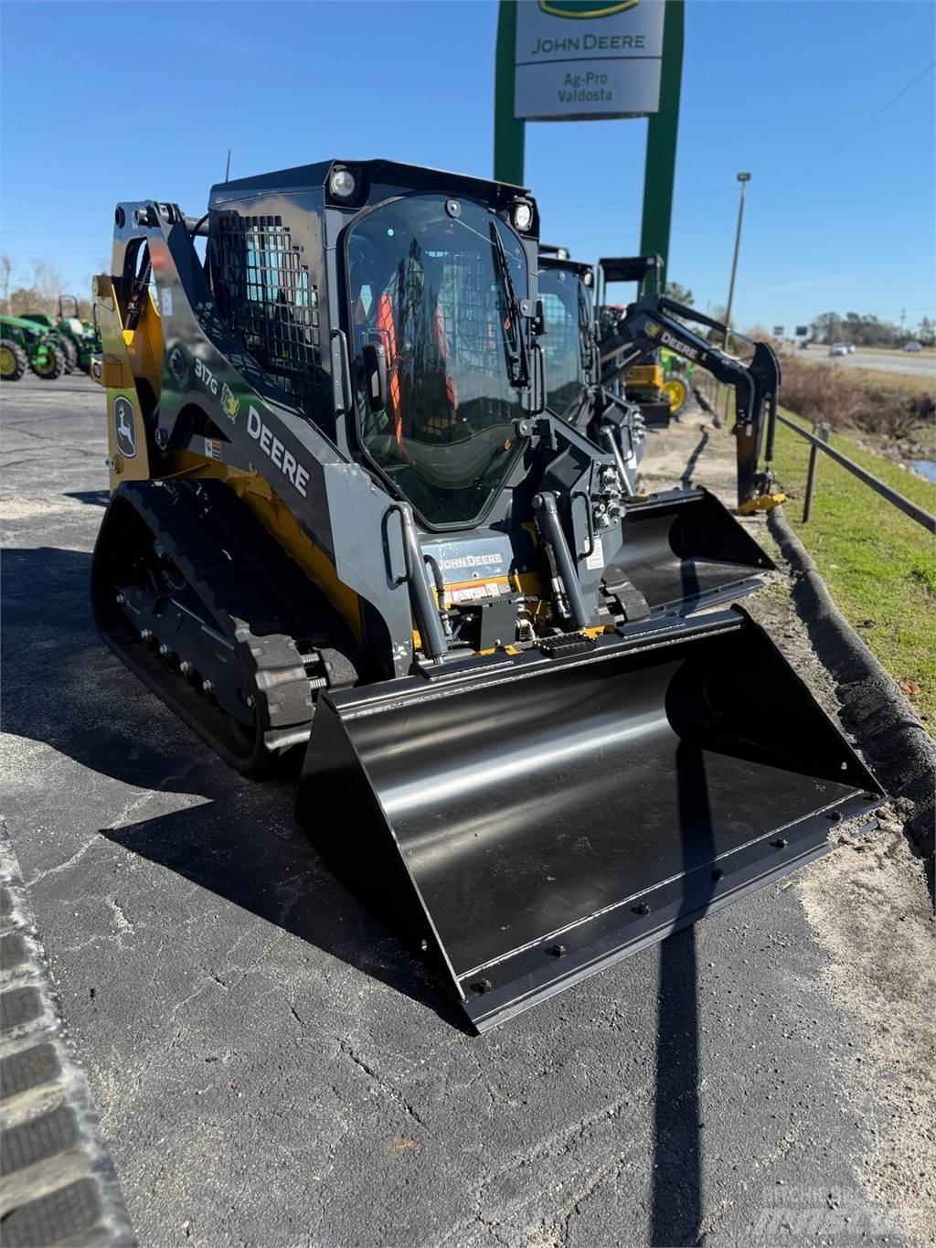 John Deere 317G Mini pale