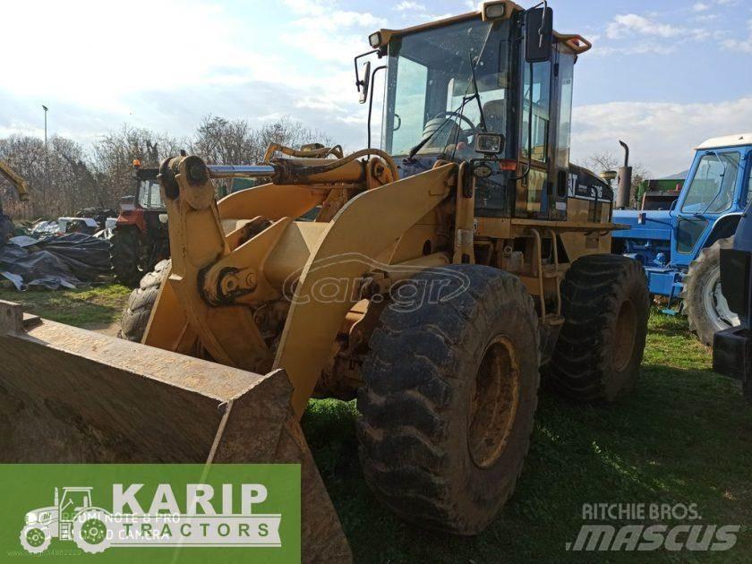 CAT 928G Pale gommate
