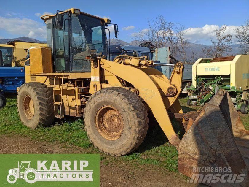 CAT 928G Pale gommate