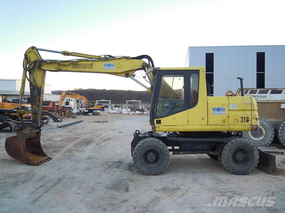CAT M312 Escavatori gommati