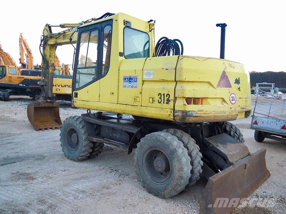 CAT M312 Escavatori gommati