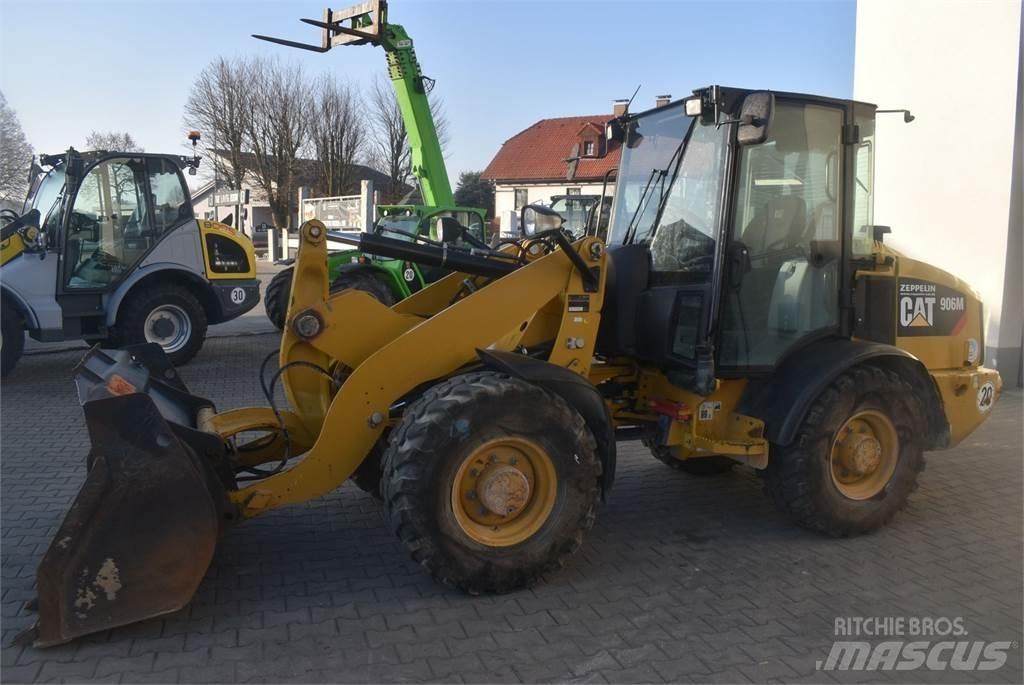 CAT 906M Pale gommate