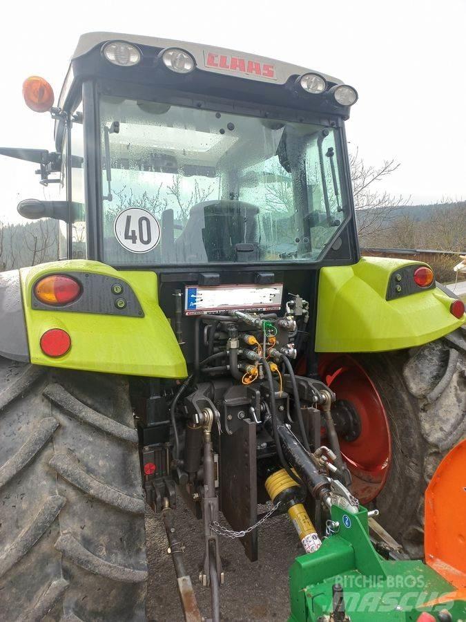 CLAAS Axos 330 CX Trattori