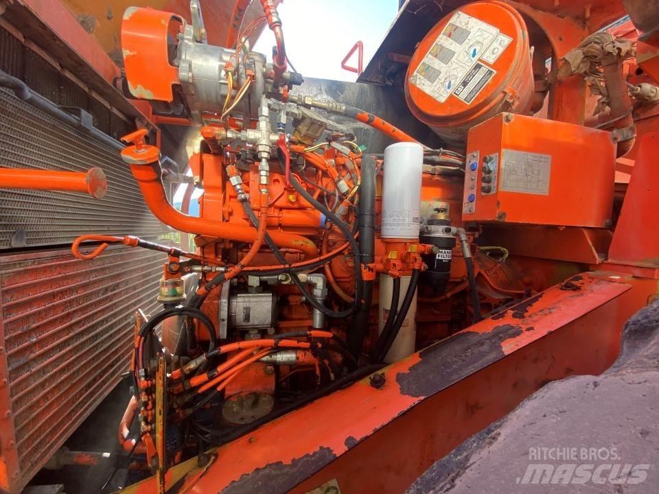 CAT 950G Pale gommate