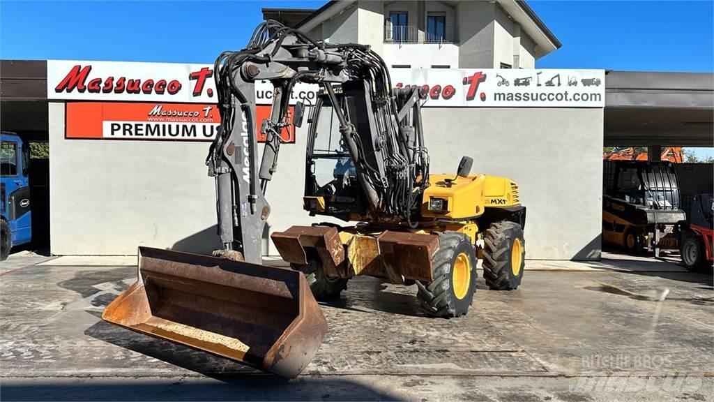 Mecalac 12MXT - E Escavatori gommati