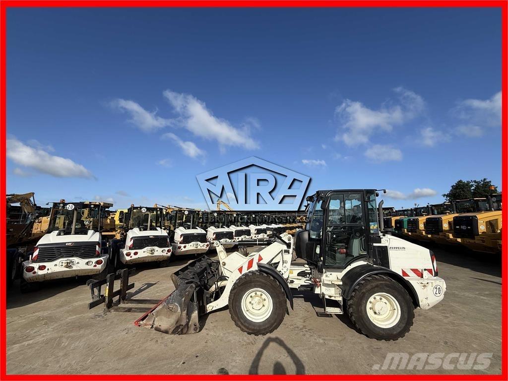 CAT 908M Pale gommate