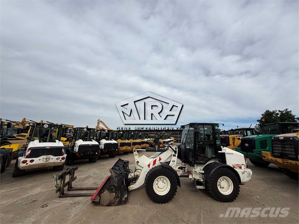 CAT 908M Pale gommate