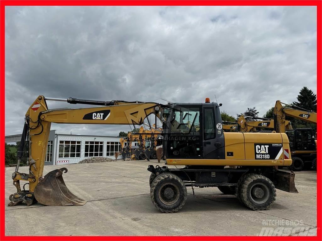 CAT M 318 D Escavatori gommati