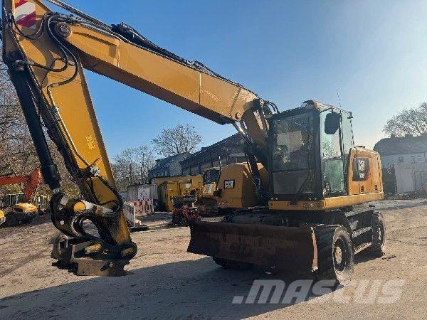 CAT 318F Escavatori gommati