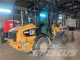 CAT 906M Pale gommate
