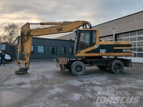CAT M320 Escavatori gommati