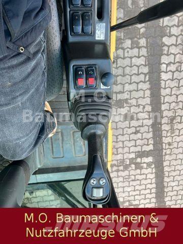 CAT MH 3022 Escavatori gommati