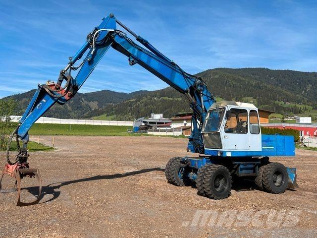 Fuchs 713 Escavatori gommati