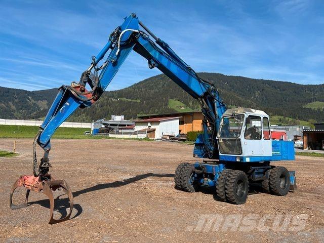 Fuchs 713 Escavatori gommati