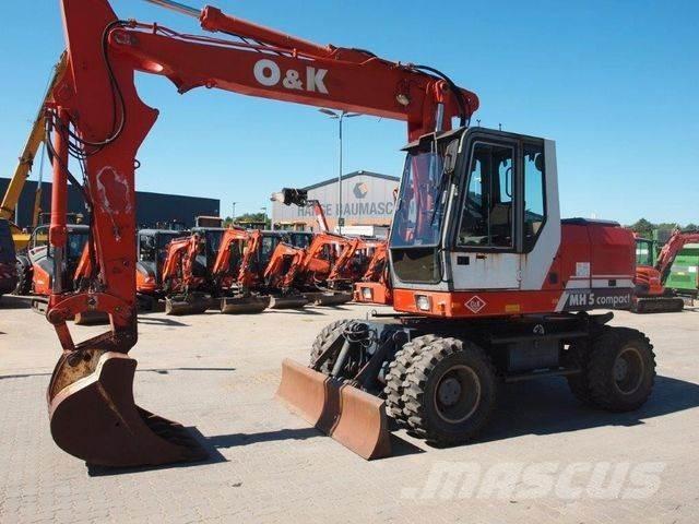 O&K MH 5 Compakt Escavatori gommati