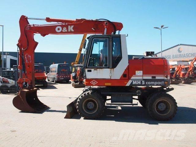 O&K MH 5 Compakt Escavatori gommati