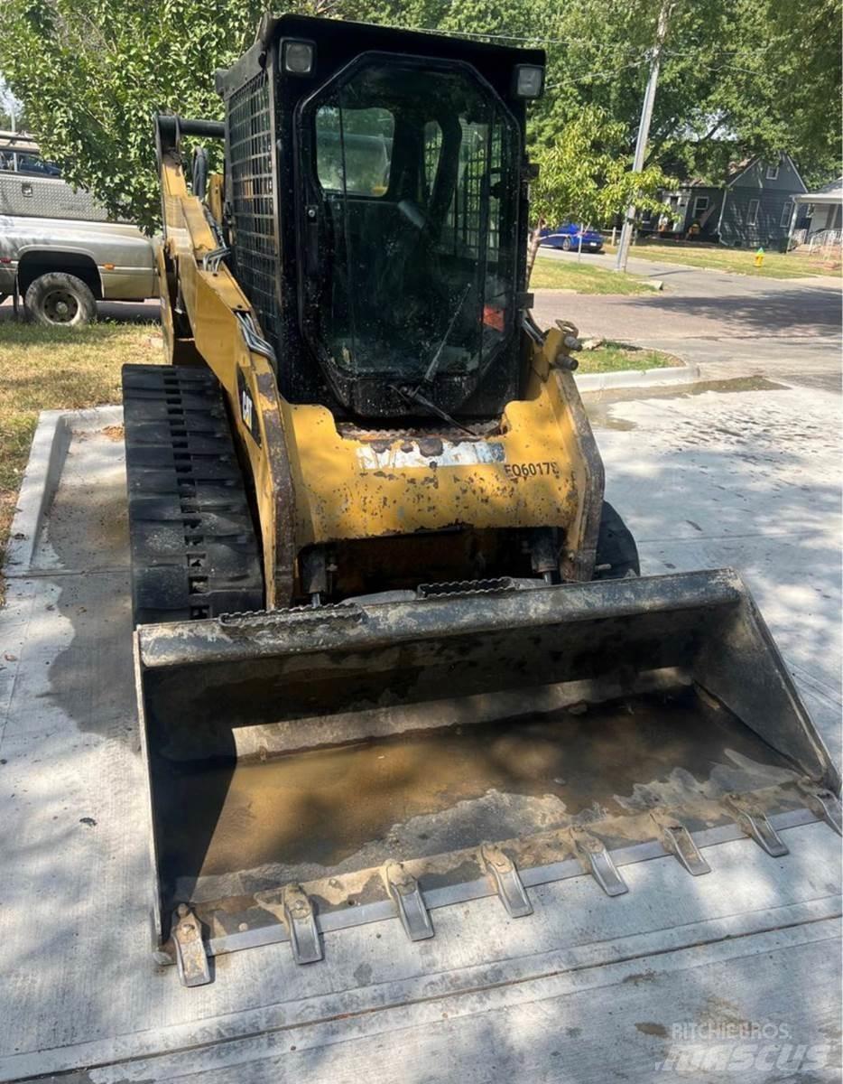 CAT 259B3 Mini Pale Gommate